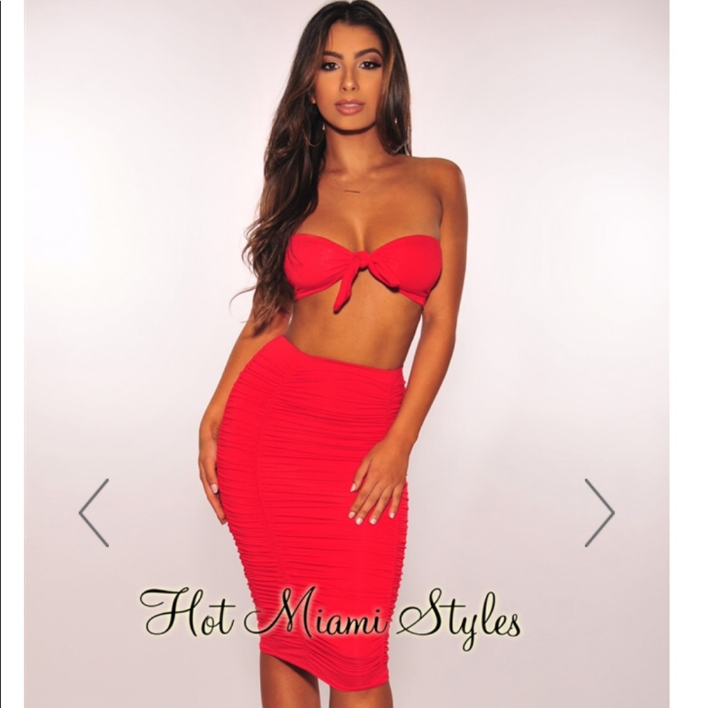 Red matching two-piece skirt and top set.